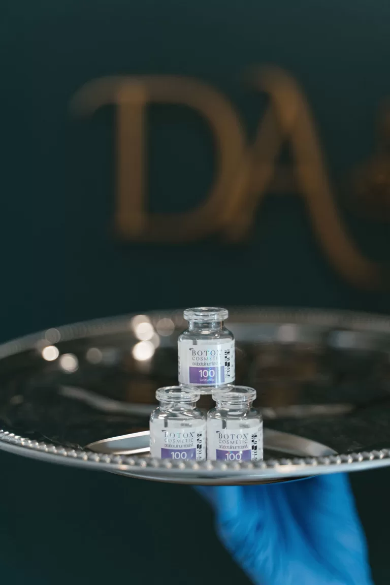 close up of BOTOX vials on a silver platter