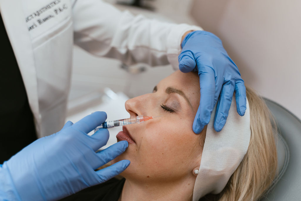 patient receiving under-eye filler injection