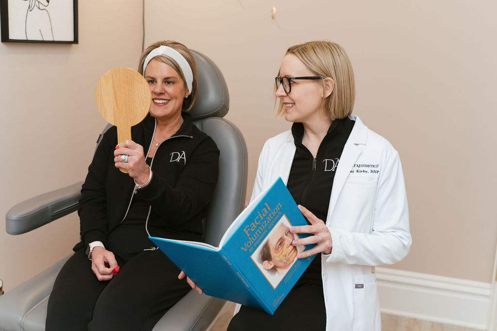 Tammy Kirby, DNP meets with patient in office