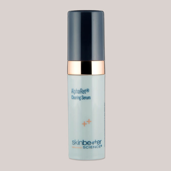 A high-resolution image of the AlphaRet Clearing Serum, Travel Size, featuring a custom-designed background and lighting that showcases the serum's packaging, designed to clear blemishes and improve skin clarity through its advanced formulation.