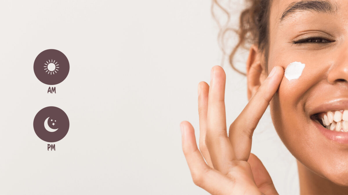 a female adding moisturizer to her face